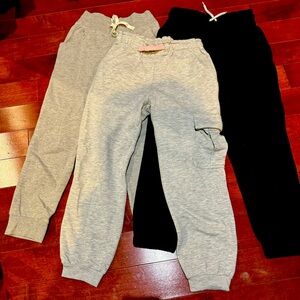 Girls joggers. 3 pairs-grey cargo joggers; grey joggers;black joggers